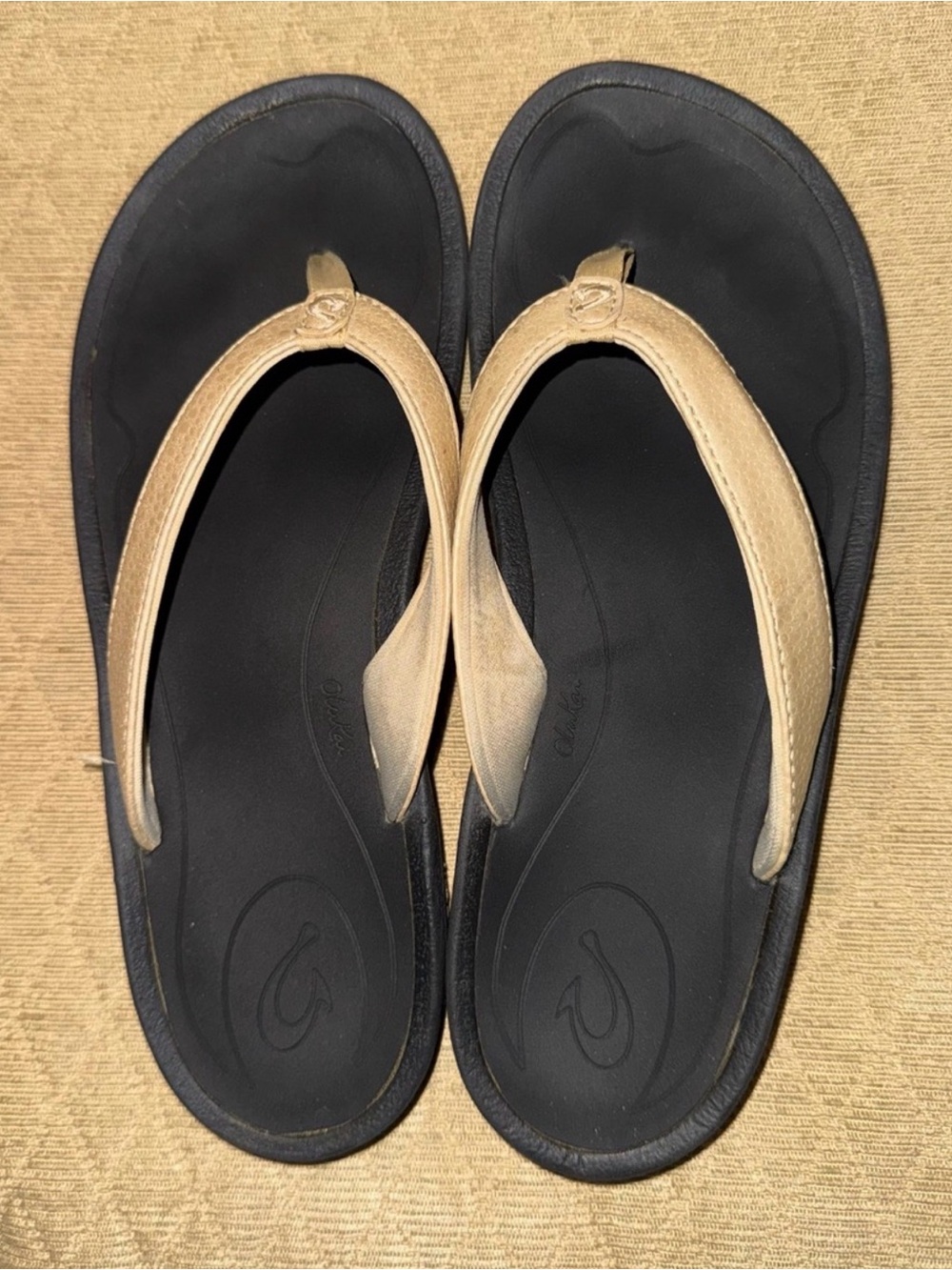 OluKai size 8 Black Footbed Sandals with Gold Straps
